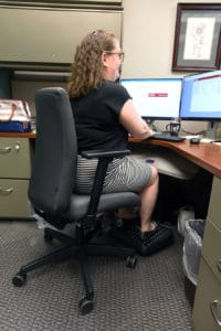 Employee sitting at desk